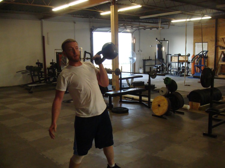 Justin Throwing arond the 1.5 pood