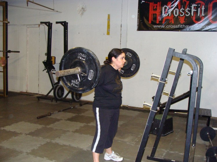 Amanda squating 95 lbs x 100 reps!!! This was pure determination and I am glad I was there to see it.